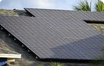 Solar panels installed on a shingle roof