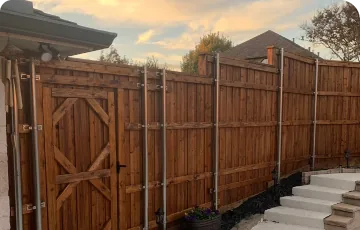 Wooden privacy fence and backyard gate